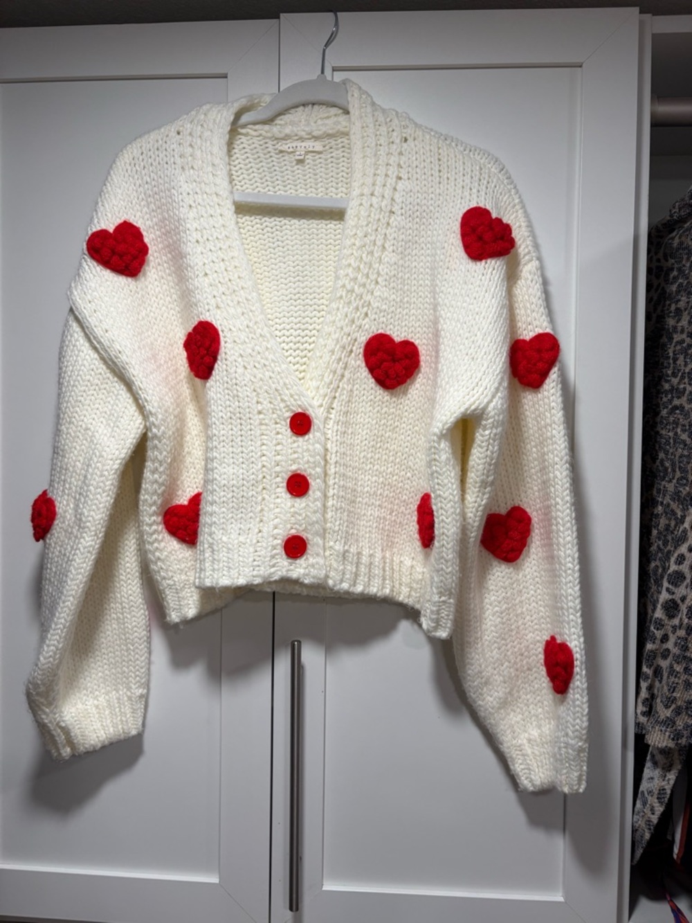 Cozy White Cardigan with Red Heart Accents — Button Front